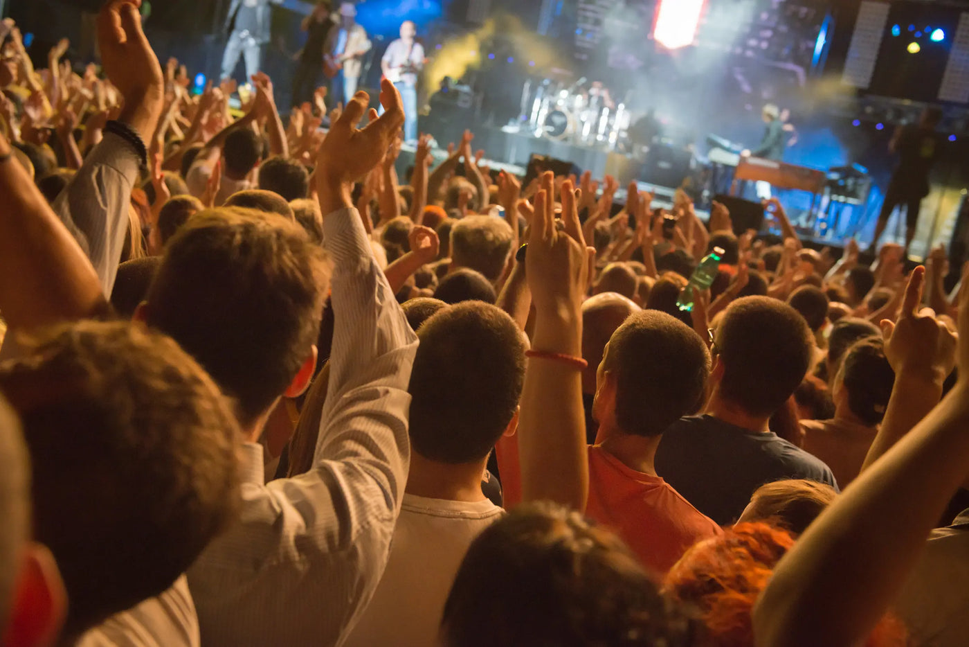 Point-of-view shot from a concert crowd, ready to share from the iVUE app